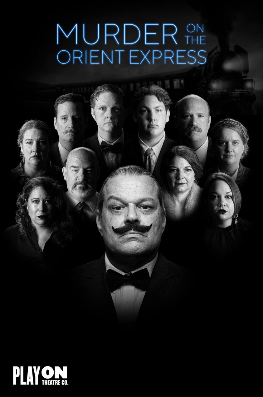 Cast of the play posing for a dramatic photo where one man with a fancy moustache is center and the other 10 cast members are behind him all facing the camera. Serious expressions